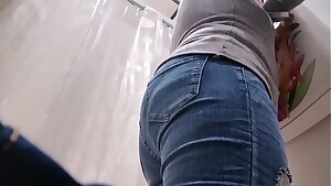 Your slutty Italian mother tries on jeans while wearing a butt plug in her ass