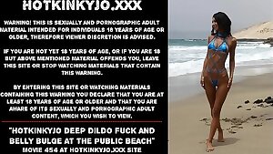 Hotkinkyjo deep dildo fuck and tummy bulge at the public beach